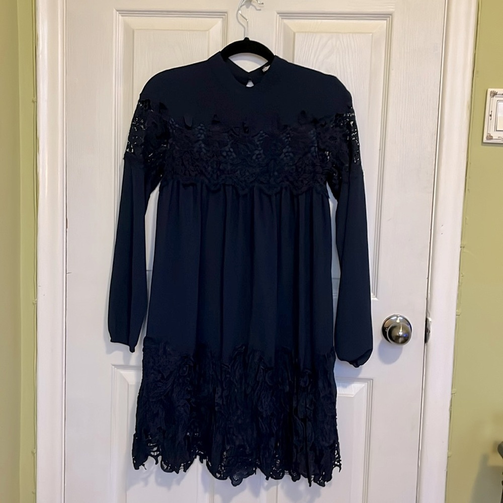 Navy high neck dress with lace details